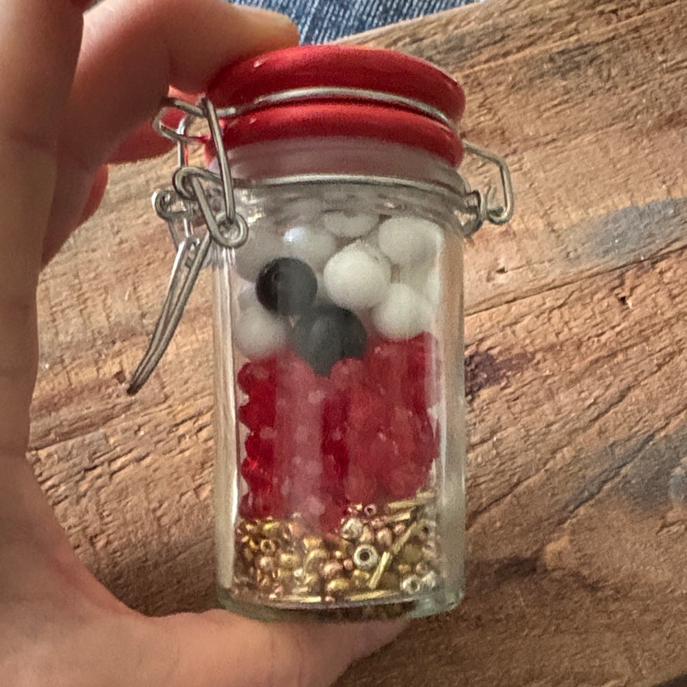 Glass Jar with Beads and Red Lid